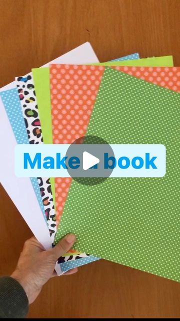 A preschool teacher and mom in CA ☀️ on Instagram: "Make a book! Encourage writing, drawing, doodling with this easy-to-make book.   🖐🏼With most preschoolers, I have to provide support with getting rubber band around popsicle stick ends but they all want to try and love to write and draw in these books.  All you need: 1. Paper 2. Hole punch 3. Rubber bands 4. Popsicle stick  📕 Select a cover and 3-5 pieces of 8.5x11 paper or cut in half (the more paper you have the more challenging to hole punch)  📗 Fold paper   📘 Hole punch approximately 1/2 inch from fold   📙 Add another hole punch approximately 2.5-4.5 inches from  first one depending on length of popsicle stick  📕 Pull one end of rubber band through top hole and place around one end of popsicle stick  📘 Pull the other end of ru Hole Punch Crafts, Make A Book, Writing Drawing, Popsicle Stick, Preschool Teacher, Popsicle Sticks, Rubber Band, Book Making, Rubber Bands