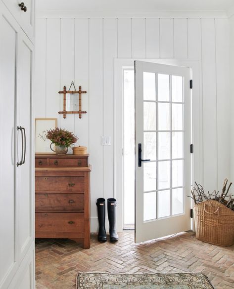 Amber Interiors   Brick floor Black hardware White door Best White Paint, Herringbone Floor, Wooden Floors, White Paint Colors, Brick Flooring, Amber Interiors, Decoration Inspiration, Terra Cotta, First Home