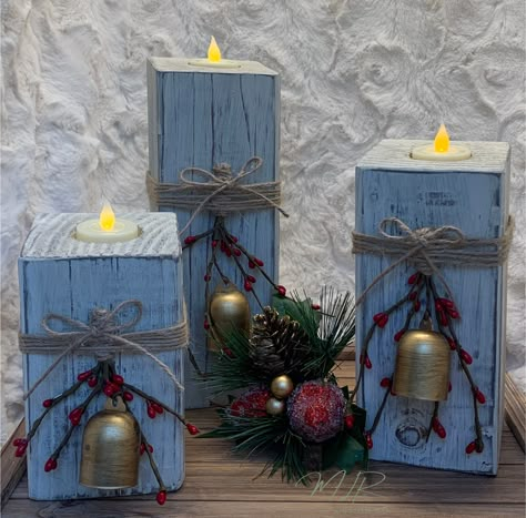 This adorable set of Christmas tea light candle holders will make a great addition to your Christmas decor! These candle holders look great as a centerpiece on the dining table, on the mantel, shelf or just about anywhere you put them!  These candle holders are handmade and distressed so no two sets are exactly alike.  They come already decorated with a gold Christmas Bell, twine and berries. The blocks are approximately 6, 8, and 10 inches high and 3 1/2 inches wide.  PLEASE KEEP IN MIND EACH C Christmas Wood Candle Holders, Wood Block Crafts Christmas, Wooden Block Crafts, 4x4 Candle Holders, Reclaimed Wood Christmas Decor, Diy Jenga Blocks Ideas, 4x4 Crafts, 4x4 Wood Crafts, Christmas Candleholders