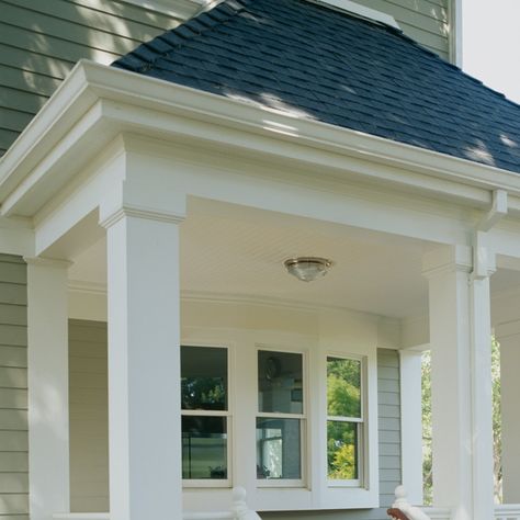 Porch trimmed out with S4SSE trim boards.; beams, column wraps and exterior trim. S4SSE available in Traditional or Protected. Front Porch Column Trim Ideas, Column Trim Molding, Column Wrap Ideas Porch Posts, Wrapped Beams Porch, Front Porch Beams Columns, Exterior Moldings And Trim, Front Porch Pillars Columns, Crawlspace Doors, How To Wrap Porch Posts