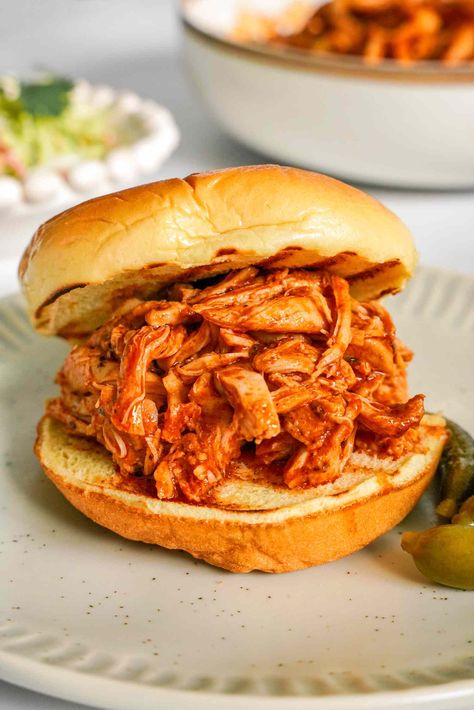 This pulled chicken with a homemade barbecue sauce comes together on the stovetop, making it a faster alternative to the oven or slow cooker variety without sacrificing any flavor or tenderness. Barbecue Pulled Chicken, Pulled Chicken Recipe, Summer Barbecue Food, Pulled Chicken Recipes, Bbq Pulled Chicken, Stove Top Chicken, Homemade Barbecue Sauce, Pulled Chicken, Barbecue Chicken