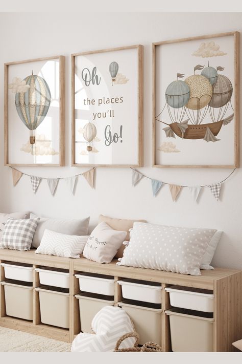 Introduce a touch of whimsy and adventure to your nursery with our charming "Oh, the Places You'll Go" set of three prints. This delightful collection features a hot air balloon and airship soaring through the clouds, capturing the essence of exploration and the exciting journey that lies ahead for your little one.Whether you're decorating a nursery for a newborn or adding a whimsical touch to a toddler's room, our "Oh, the Places You'll Go" set of three prints is a delightful choice. New Born Room Designs, Gender Neutral Bear Nursery, Teddy Bear Nursery Theme Gender Neutral, Baby Boy Nursery Teddy Bear Theme, Nursery Bear Theme, Teddy Bear Themed Nursery, Baby Boy Teddy Bear Nursery, Baby Boy Bear Nursery, Teddy Bear Room Decor