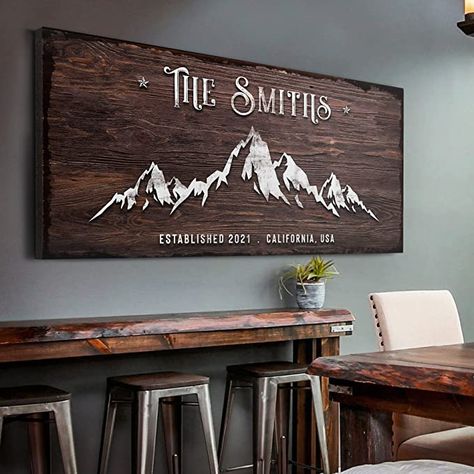 Amazon.com: Tailored Canvases Mountain Wall Art Decor - Personalized Large Rustic Sign for Cabin, Cottage, Camping Site, Entryway, Patio & Custom Gift Idea for Couples, Wedding, Anniversary - Family Mountain Home : Home & Kitchen Adventure Home Decor, Cabin Theme Living Room, Family Signs Wooden, Wall Sign Ideas, Ski Condo Decor, Mountain Signs, Canvas Sayings, Mountain Lodge Decor, Wallace Idaho