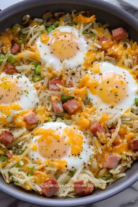 This easy Breakfast Hash Brown Casserole Recipe with egg can be made with leftover ham, sausage, and/or bacon. Even ground beef would work in this dish, it's that versatile. Potatoes can be fresh or frozen hash browns. It's super tasty with loads of melted cheese.  Make this simple breakfast ahead for a brunch or breakfast meal to remember. #breakfasthash #hashbrowneggcasserole #spendwithpennies #hamandpotatohashbrowncasserole Breakfast Hash Recipes, Ham Breakfast, Leftover Steak, Breakfast Hashbrowns, Ham Casserole, Leftover Ham Recipes, Hash Recipe, Hashbrown Recipes, Ham And Beans