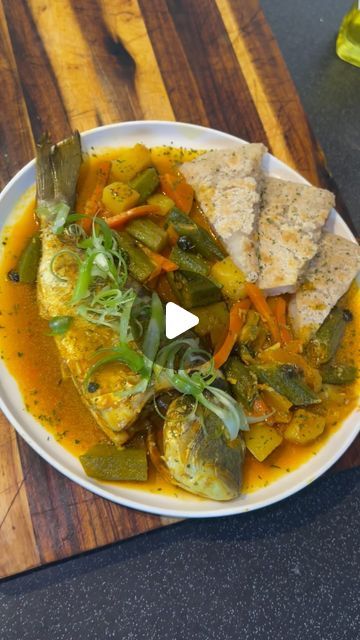 Chives & 🥔 on Instagram: "Jamaican style coconut curry steam fish and bammy ..  #fish #curry #jamaicanfood #steamfish #bammy #coconut" Jamaican Steamed Fish, Jamaican Fish, Steam Fish, Caribbean Foods, Steamed Fish, Fish Curry, Jamaican Recipes, Coconut Curry, Caribbean Recipes