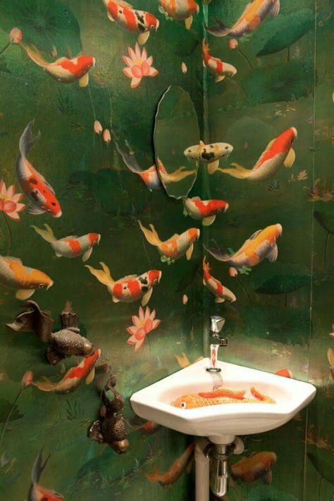 What incredible detail and a stunning design which has even followed through to the corner basin - see the fish? We love these nature-inspired wallpapers #bathroom #bathroomdesign #wallpaper #bathroomwallpaper Fish Wallpaper Bathroom, Wallpaper Bathroom Ideas, Wc Decoration, Lotus Wallpaper, Wallpaper Bathroom, Fish Wallpaper, Vogue Living, Bathroom Wallpaper, Wallpaper Wall