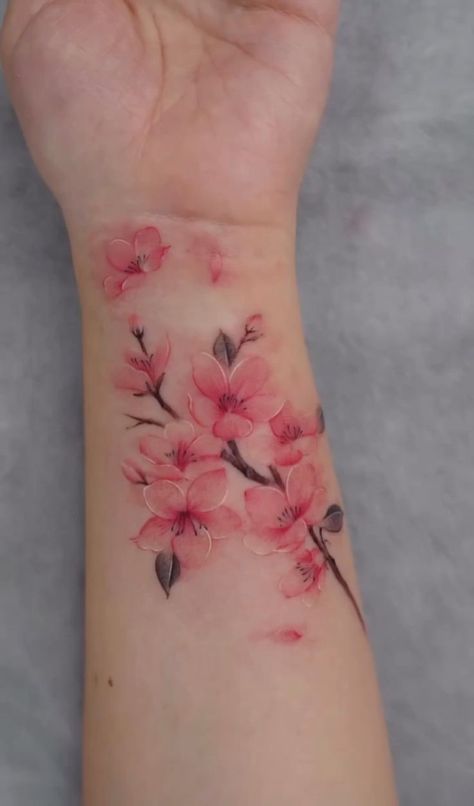 Sakura Flower Tattoo, Tattoo Sakura, Frangipani Tattoo, Arm Sleeve Tattoos For Women, Sakura Tattoo, Tattoos To Cover Scars, Flower Wrist Tattoos, Small Pretty Tattoos, Flower Tattoo Shoulder