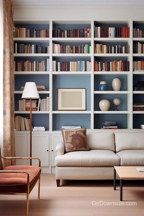 25 Great Built-In Bookshelves That Look Amazing Modern Home Library, Color In Interior Design, Bookshelves Living Room, Cozy Reading Chair, Living Room Library, Gray Room, Home Library Rooms, Built In Shelves Living Room, Bookshelves In Living Room