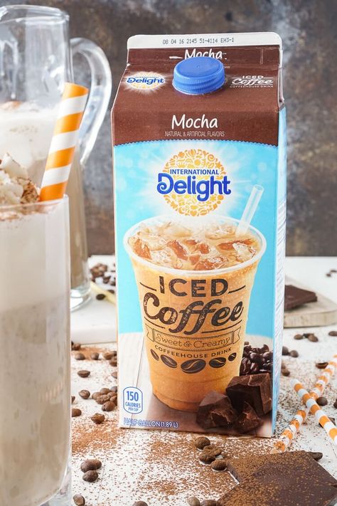 This Mocha Coffee Punch is bound to be a new party favorite by hosts and guests alike! It's easy to make and tastes amazingly creamy and delicious! Made with mocha iced coffee, sugar, milk, and vanilla ice cream, you'll love the fresh new take on the traditional party punch! Mocha Punch Recipe, Mocha Punch, Rehearsal Brunch, International Delight Iced Coffee, Mocha Iced Coffee, Iced Hot Chocolate, Coffee Punch, Hosting Dinner, Iced Mocha