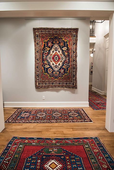 Featured Client's Home Immersive Assemblage of Several Top-Level Tribal Rugs Transforms Passageway Into Inspirational Oasis. Click to read more about this client's home. Rug On Wall, Speakeasy Room, Wall Rugs, Fabric Wall Decor, Indian Home Interior, Carpet Decor, Abstract Pattern Design, Wall Rug, Antique Persian Rug