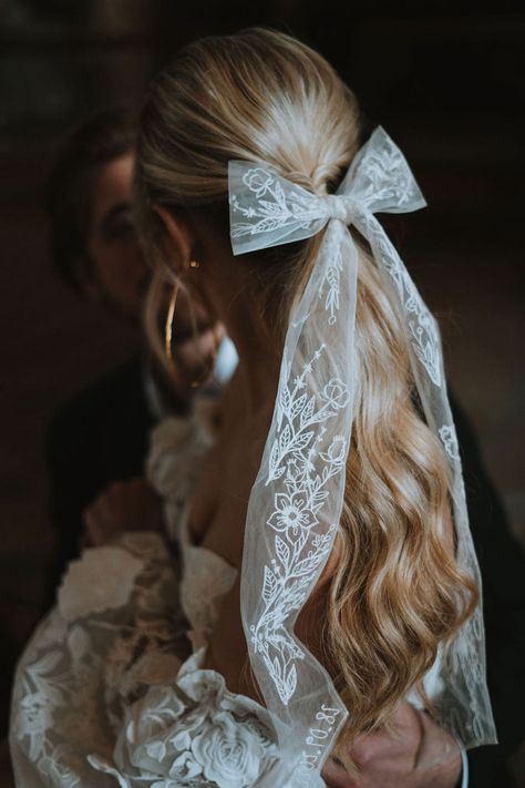 Wedding Hair Ponytail With Bow, Big Bow Wedding Hair, Hair Ribbon Wedding, Bridal Bows Hair, Wedding Hair With Bow And Veil, Bow In Hair Wedding, Wedding Vail With Bow, White Bow Wedding Hair, Bow Wedding Hairstyles