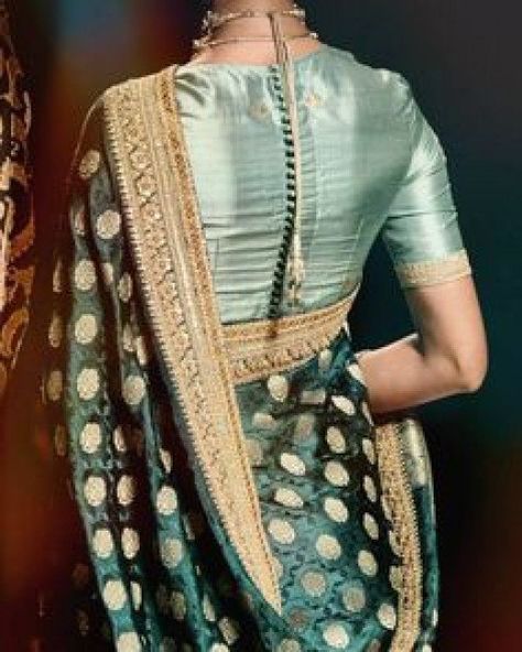 silk saree blouse with putli buttons down the centre of the blouse back Chania Choli, Sari Style, Sabyasachi Mukherjee, Wedding Trousseau, Feather Touch, Blouse Designs High Neck, Blouse Designs Catalogue, Blouse Ideas, Best Blouse Designs