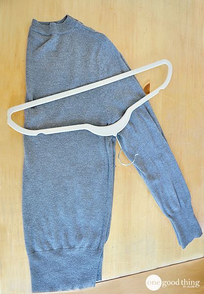 Fold Sweater On Hanger, How To Fold A Sweater Over A Hanger, Folding Sweaters On Hangers, Hanging Sweaters On Hangers, Sweater Folding Hacks, Fold A Sweater, Folding Sweaters, Fold Sweaters, How To Fold Sweaters