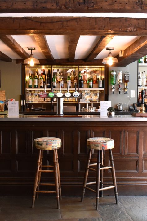 From the wooden beams to cosy fireplaces and traditional bar stools, Dukes Bar holds complete rustic charm. Perfect for a drink and catch up with friends. Traditional Bar Stools, Traditional Bar Stool, Traditional Restaurant, Cosy Fireplace, Traditional Bar, Flagstone Flooring, Inglenook Fireplace, Classic Bar, Bar Interior