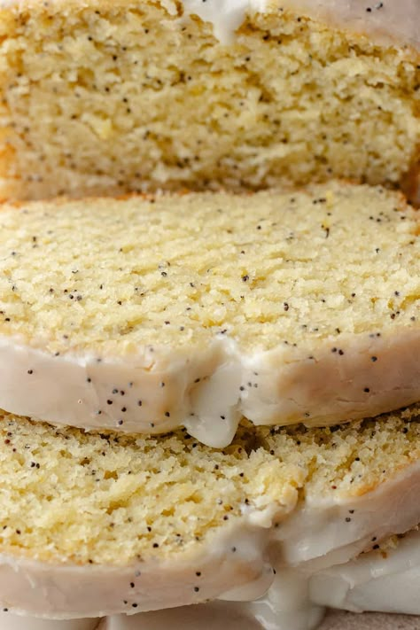 This ultra moist and tender Lemon Poppy Seed Yogurt Loaf Cake will surely satisfy all your lemon cravings! It's naturally flavored with loads of lemon zest, speckled with crunchy poppy seeds and finished with a tart lemony glaze! Moist Lemon Poppyseed Loaf, Moist Lemon Poppyseed Cake, Lemon Poppy Cake, Sweet Egg White Recipes, Yogurt Loaf Cake, Lemon Poppyseed Loaf, Lemon Poppy Seed Loaf, Poppy Seed Cake Recipe, Lemon Poppy Seed Cake