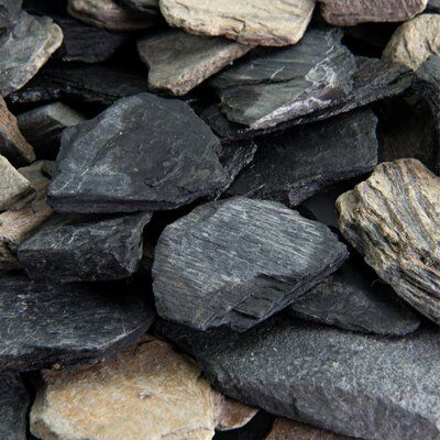 Fire Pit Essentials Natural Black and Tan Slate Chips Landscaping Rocks | Wayfair Slate Chips Landscaping, Cedar Garden Bridge, Decorative Garden Stones, Landscaping Rocks, Fire Pit Essentials, Landscaping Rock, Slate Rock, Outdoor Gardens Landscaping, Decomposed Granite