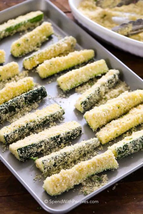 Crispy oven fried Zucchini sticks are a great snack, side or appetizer. Panko and parmesan cheese make a crispy exterior and for tender garden zucchini! #spendwithpennies #zucchinifries #parmesanzucchinifries #friedzucchini #ovenfried #appetizerrecipe #easyrecipe Fried Zucchini Sticks, Oven Fried Zucchini, Zucchini Pommes, Fried Zucchini Recipes, Baked Zucchini Fries, Parmesan Zucchini Fries, Zucchini Recipes Baked, Oven Baked Fries, Crispy Oven Fries