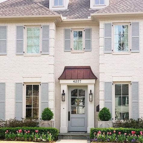 Shutters, brick, and a copper awning — just love all the charm of this traditional home!! 😍 📷: @thepottedboxwood | Instagram Potted Boxwood, Painted Brick Exteriors, Shutter Colors, Dallas House, Painted Brick House, Blue Shutters, Paint Tips, House Photo, Brick Exterior House