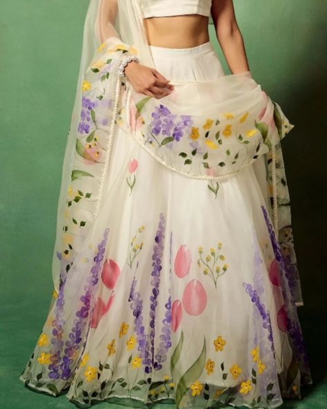 🌟✨ Unveiling my latest masterpiece! ✨🌟 This exquisite hand-painted organza lehenga in a dreamy off-white hue features vibrant, full prints that will make you stand out at any celebration! Perfect for weddings, parties, or any special occasion. 💖💃 Don't miss out! DM me for details and let's make this beauty yours! Shipping World wide 🌏 Customisation available..🎨🖌️ 🥰 #LehengaLove #HandpaintedFashion" @houseofhandpaintedorganza #houseofhandpaintedorganza #instagram #HandpaintedBeauty #handma... Organza Painting, Hand Painted Lehenga, Painted Lehenga, Cloth Painting, Organza Lehenga, Fabric Paint Designs, Organza Sarees, Painted Clothes, Hand Painting