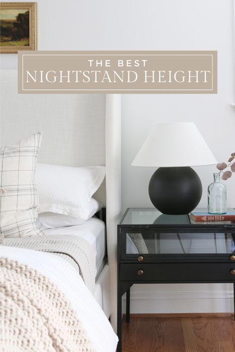 white upholstered bed with black nightstand, bedside lamp and decor Nightstand Height To Bed Guide, Nightstand Styling Bedside Tables, Different Nightstands On Each Side, Nightstand Styling Ideas, Nightstands Ideas Bedside Tables, Nightstand Height, Bedside Table Decor Ideas, Mismatched Nightstands, Shelf Styling Ideas