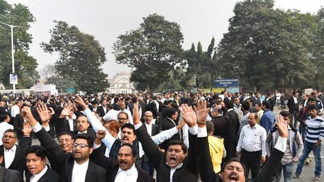 They are protesting the murder of Advocate Virender Kumar Narwal, who was shot dead by two unidentified bike-borne assailants in Delhi's Dwarka area on Saturday. Chief Justice Of India, Bar Bench, District Court, August 26, News India, The Bar, Lawyer, India, Road