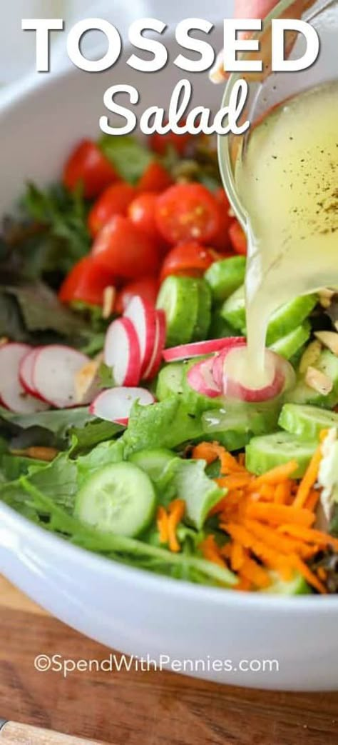 This simple tossed salad recipe is the perfect way to enjoy your garden vegetables! It is full of fresh lettuce, tomatoes, cucumbers and any other mixed vegetables you wish all drizzled with a delicious dressing! Mmmmm.... #spendwithpennies #tossedsalad #gardenvegetables #farmersmarketvegetables #sidesalad #healthyeating Simple Tossed Salad, Garden Salad Recipe, Almond Salad, Salad Macaroni, Lettuce Salad Recipes, Vegetable Salad Recipes, Green Salad Recipes, Fresh Salad Recipes, Spend With Pennies