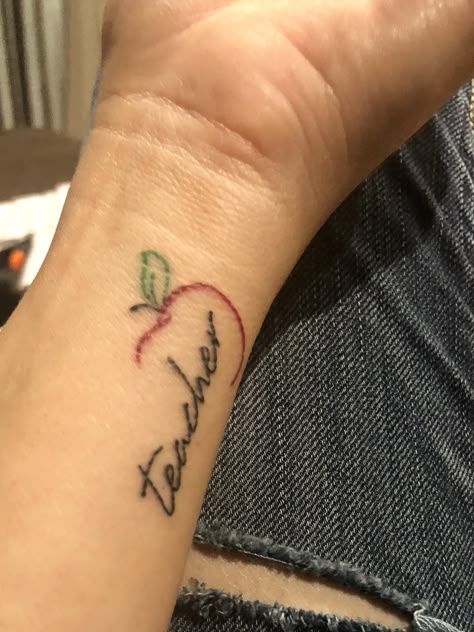 Teacher Tattoo. 20 year anniversary in education. #teachertattoo #appletattoo #redapple #wristtattoo Latin Kings Tattoos, Teaching Tattoos, Teacher Tattoo, Teacher Tattoos, Apple Tattoo, About Teacher, Places For Tattoos, Tattooed Teacher, Forarm Tattoos