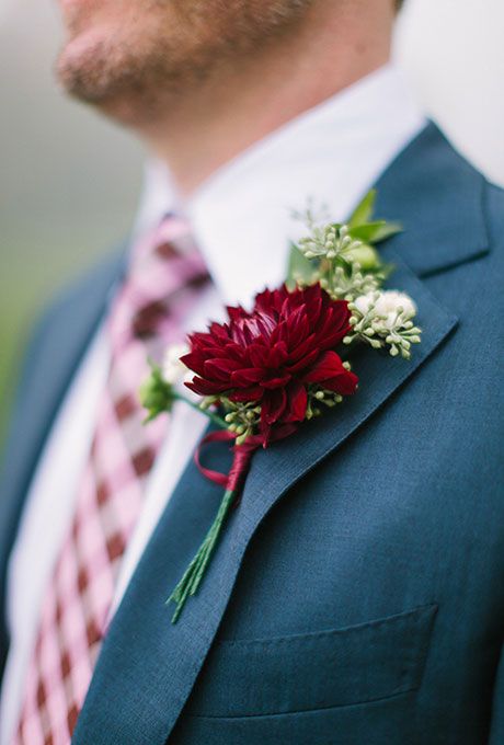 Groom's Boutonnieres for Fall Wedding: Boutonniere with Burgundy Dahlia and Seeded Eucalyptus | Brides.com Dahlia Wedding Bouquets, Burgundy Dahlia, Dahlias Wedding, A Man In A Suit, Marsala Wedding, Man In A Suit, Groom Boutonniere, Fall Wedding Flowers, Eucalyptus Wedding