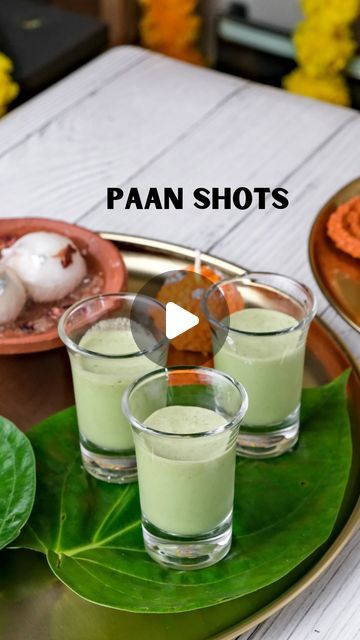 Mahima Dhoot on Instagram: "Paan Shots ✨🕺🏻  Festive Season is all about parties and SHOTS! 🤪   So for the Episode 2 of Festive Eats and Treats, I made my most loved recipe of all time, Paan Shots😎✨ These vibrant, minty little drinks are the coolest way to spice up any party. A fresh twist on tradition that’ll leave everyone asking for more! 💚🥂  Recipe: - to a blender add 4 paan leaves (beetle leaves) add 3 scoops vanilla ice cream, 1 tsp saunf, 1 tbsp gulkand, 1/2 tsp elaichi powder & ice  - ⁠blend & serve chilled!  Dining With Dhoot, Mahima Dhoot, Festive Eats, Home Made, Paan Shots, Paan Recipes, Unique, Explore, Diwali  #diningwithdhoot #festive #eats #diwalifood #paanshots #parties #diwaliparty #shotlovers #explore" Paan Shots Recipe, Diwali Party At Home, Recipes Unique, Leaf Beetle, Diwali Food, Dal Recipe, Diwali Party, Shot Recipes, Vanilla Ice