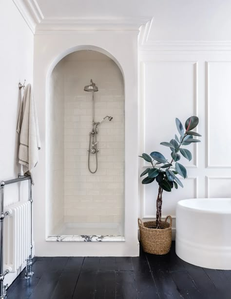 A trend forecaster's flint-fronted cottage on the south coast | House & Garden Welsh Cottage, Warm Bathroom, Devon Devon, Under Stairs Cupboard, Yellow Tile, Reclaimed Brick, American Interior, Calacatta Marble, Bathroom Wallpaper