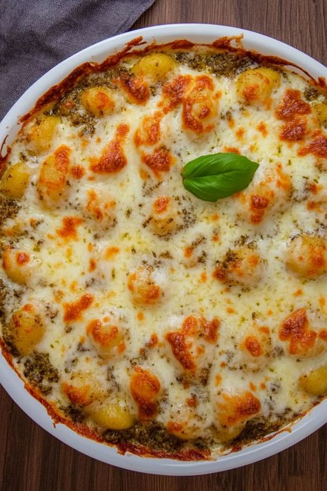 Indulge in the ultimate comfort food with this flavorful chicken pesto gnocchi casserole recipe. The combination of tender chicken, pillowy gnocchi, and savory pesto sauce creates a deliciously satisfying dish that's perfect for any night of the week. Easy to make and guaranteed to please even the pickiest eaters, this casserole is sure to become a family favorite. Chicken Pesto Gnocchi, Gnocchi Casserole Recipes, Gnocchi Casserole, Pesto Gnocchi, Chicken Gnocchi, Chicken Pesto, Gnocchi Recipes, Tender Chicken, How To Cook Sausage