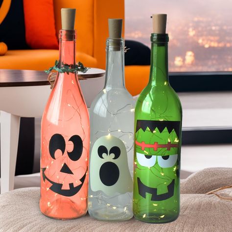 Halloween Wine Bottle Decorations, Wine Bottle Decorations, Pumpkin Frankenstein, Wine Bottle Table, Halloween Wine Bottles, Pumpkin Wine, Repurposed Wine Bottles, Battery Powered Fairy Lights, Bottle Decorations