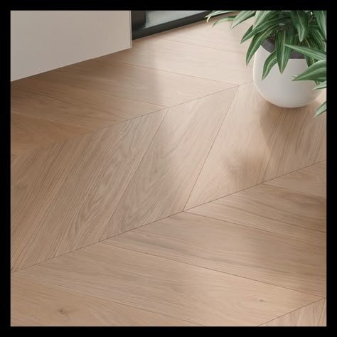 Once laid at the renowned courts of Europe, French herringbone parquet is now back in fashion.  The unique appearance of the delicate lines of the Chevron parquet flooring is particularly effective  in spacious, light-flooded rooms.   With the "Oak Clear Chevron, brushed white oil" the planks are bevelled at an angle of 45°. This creates the typical parallel lines of the chevron, known as "rafters", which, compared to the classic herringbone, appear calmer and more orderly at a 90° angle. Timeless Flooring, Chevron Parquet, Laminate Flooring Colors, Parquet Design, Herringbone Wood Floor, Natural Wood Flooring, Light Hardwood Floors, Wood Parquet, Walnut Furniture