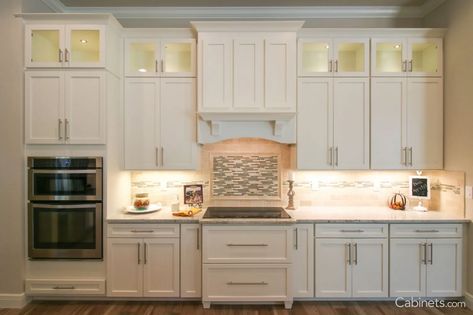 Two-Toned Kitchen with Grand Wood Hood and Stacked Glass Cabinets - Cabinets.com Stacked Cabinets, Online Kitchen Cabinets, Built In Cabinet, Two Tone Kitchen, Plywood Cabinets, Kitchen Pulls, Kitchen Cabinets Decor, Kitchen Cabinet Styles, Shaker Cabinets