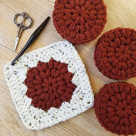 An in-progress granny square crochet blanket pattern. Crochet Projects For Fluffy Yarn, Puff Square Crochet, Puff Stitch Flower Blanket, Granny Squares Blanket Pattern, Magic Circle Granny Square, Crochet Granny Squares Free Pattern, Joining Granny Squares Crochet, Puff Flower Granny Square, Puff Granny Square