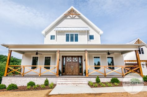 Front Porch Rails Ideas Farmhouse, Farmhouse Concrete Porch, Stained Wood Porch Railings, White Farmhouse Porch Railing, Farmhouse Porch Railing Wood, Farmhouse Porch With Railing, Cedar Front Porch Railing, Wrap Around Porch Railing Farmhouse, Concrete Porch Railing Ideas