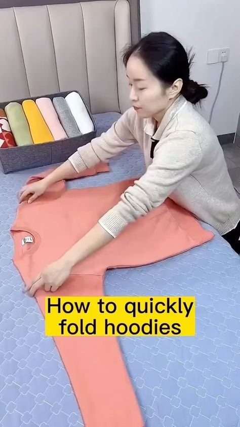 Noocx® - Smart Gadgets | How to fold hoodies💕#foldingclothes #howtofold #hoodie #fyp #organize #storageunit | Instagram How To Fold Hoodies, Moving Hacks, Clothes Folding, Diy Clothes Hacks, Packing Hacks Clothes, Shoe Lace Patterns Converse, Lace Patterns Converse, Shirt Folding, Packing Clothes