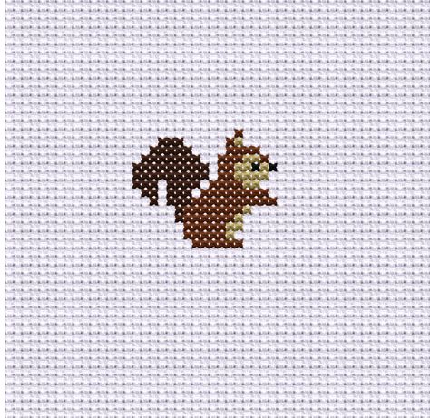 Little Baby Squirrel, Cross Stitch Pattern  Bring the charm of the forest into your home with this woodland-inspired design. Perfect for nurseries or any nature-lover's space, this cute animal cross stitch chart will add a touch of warmth and coziness. Once completed, this cross-stitch pattern can be framed and hung on the wall as a beautiful piece of art, or used to embellish a variety of items such as pillows, blankets, or tote bags. The possibilities are endless! Aida: 14 count ( 5,5 per cm) Ant Cross Stitch, Cross Stitch Squirrel Pattern, Mini Cross Stitch Animals, Woodland Cross Stitch Pattern, Cross Stitch Simple Pattern, Minimalist Cross Stitch, Little Cross Stitch Patterns, Cute Cross Stitch Patterns Easy, Simple Cross Stitch Pattern