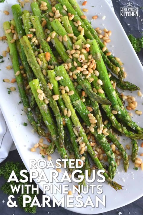 This side dish is great any time, but is best when fresh asparagus is in season. Roasted Asparagus with Pine Nuts and Parmesan has perfectly cooked asparagus with the saltiness of freshly grated parmesan and the nuttiness of delicately toasted pine nuts. Super fast, super yummy, and super easy! #asparagus #pinenuts #parmesan #roasted #sidedish Pan Seared Asparagus With Cashews, Asparagus Recipes Thanksgiving, Pinenut Recipes Dinners, Christmas Asparagus Recipes, Christmas Asparagus Side, Thanksgiving Asparagus Recipes, Christmas Asparagus, Pine Nuts Recipes, Roasted Asparagus Recipes