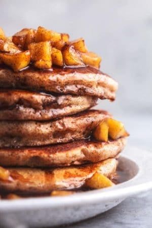 stack of apple cinnamon pancakes with apple topping and syrup Vegan Apple Cider, Apple Cider Pancakes, Applesauce Pancakes, Dijon Cream Sauce, Apple Cinnamon Pancakes, Cinnamon Pancakes, Apple Pancakes, Vegan Apple, Walnut Salad