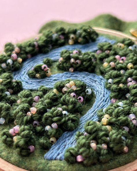 Take a walk through this green felt field and look at the blooming beaded flower bushes ✨ . . . #embroidery #embroidered #needlework #handembroidery #fiberart #fibreart #textileart #dmc #threads #dmcthreads #embroideryartist #embroideryart #aeriallandscape #aerialembroidery #landscapeembroidery #hoopart#freestyleembroidery #embroideryhoopart #handmade #handstitched #smallbusiness #aerialviewart #natureinspired #botanicalembroidery #threadart Flower Bushes, Thread Art, Take A Walk, Embroidery Hoop Art, Hoop Art, Aerial View, Embroidery Art, A Walk, Textile Art