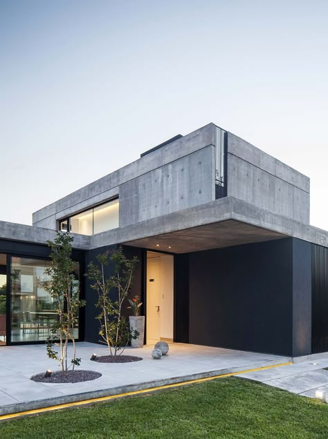 Contemporary Home of Young Couple in Buenos Aires Clad in Concrete and Glass Cement House Design, Concrete House Exterior, Concrete Home Design, Modern Concrete House, Concrete House Design, Cement House, Concrete Staircase, Concrete Houses, Concrete Home