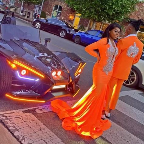 Orange And Silver Prom Suit, Orange And Tan Prom, Orange Prom Black Couple, Orange Prom Suit, Orange Prom Couple, Prom Couples Black People, Silver Prom Suits, Prom Black Couples, Guys Prom Outfit