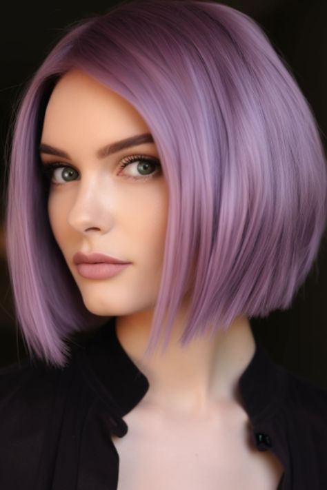 The sleek bob in a lavender shade makes a bold fashion statement. It’s perfect for those with hair and adds a modern twist to the timeless bob hairstyle. Click here to check out more cute and fun shoulder-length haircuts and hairstyles. Lavender Hair Colors, Light Purple Hair, Bob Haircut Curly, Deep Magenta, Pastel Pink Hair, Coloured Hair, Sleek Bob, Lavender Hair, Hair 2024