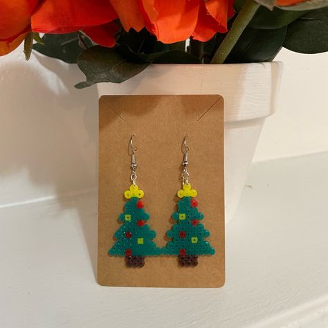 Perler Bead Christmas Tree Earrings Green, Brown, Red And Yellow New Handmade 1.5” Inches Perler Beads Bundle To Save Don’t Be Afraid To Send Offers :) Xmas Perler Bead Patterns, Halloween Perler Earrings, Christmas Perler Bead Earrings, Christmas Iron Beads, Perler Bead Decor, Perler Bead Christmas Tree, Perler Bead Jewelry, Christmas Perler Bead Patterns, Perler Bead Christmas