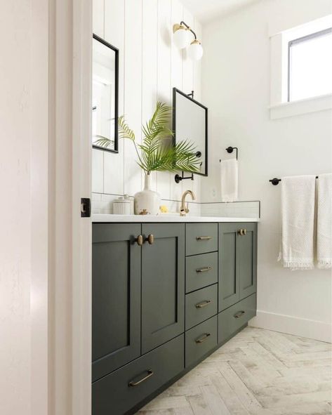 Herringbone Tile Floor with Dark Green Vanity - Soul & Lane Black White And Dark Green Bathroom, Dark Green Vanity Bathroom Ideas, Green Tile Master Bath, Dark Green Vanity Bathroom, Dark Green Bathroom Vanity, Dark Green Vanity, Herringbone Tile Floor Bathroom, Bathroom Ideas Dark Green, White Herringbone Tile Floor