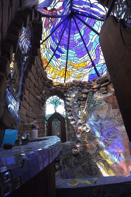 Hubbell House master bathroom ceiling  Architect: James Hubbell  Location: Santa Ysabel, CA  James Hubbell has been building and adding to his home on a hilltop outside of San Diego, CA for over 30 years. It's clearly inspired by Gaudi (and walking the grounds feels a lot like a mini Park Guell), among other influences. But Hubbell is a master of organic architecture and walking through his estate is a rare treat. It's open to the public every year on Fathers' Day. Stained Glass Skylight, Glass Skylight, Stained Glass Ceiling, Bathrooms Ideas, Earthship Home, Cob House, Beach Retreat, Earth Homes, Natural Building