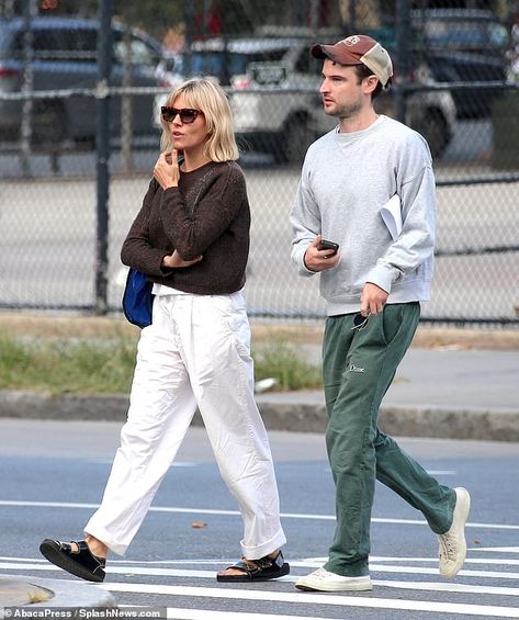 Sienna Miller and ex-boyfriend Tom Sturridge enjoy a casual post-lunch stroll in New York | Daily Mail Online Sienna Miller Boyfriend, Wine Corner, Tom Sturridge, Brown Jumper, Khaki Joggers, Becoming An Actress, Dirty Blonde Hair, Grey Jumper, Sienna Miller