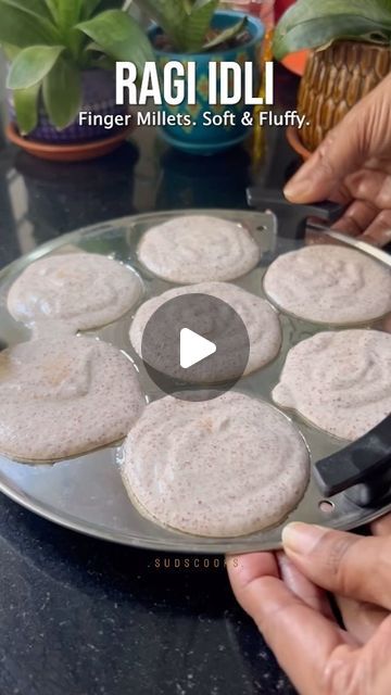 Sudha - Suds cooks on Instagram: "Ragi idli - another healthy idli recipe this time using Ragi/ Finger Millets Finger millet is an extremely nutritious cereal & contains about 5–8% protein, 1–2% ether extractives, 65–75% carbohydrates, 15–20% dietary fiber and 2.5–3.5% minerals.(As per vikaspedia) ✨ I grind the batter in 2 batches in the mixie. Ragi grains take a while to grind, don’t worry if your batter seems grainy, pause and grind some more until smooth. ✨ the batter should be free flowing like in the video, not too thick or too thin ✨ in hot weather the batter might ferment within 3-4 hours, and to double in volume so leave it in a large bowl to ferment ✨ you can also make dosa with this batter ✨ these idlis remain soft in the fridge too! Enjoy! idli, idli sambar, south indian bre Finger Millet Recipes, Ragi Recipes Indian, Ragi Idli Recipe, Idli Batter Recipe, Ragi Recipes, Ragi Dosa, Idli Sambar, Dosa Batter, South Indian Breakfast