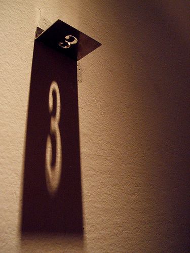 Like the use of shadow as the design element - want to do something like this for an exhibition installation Wayfinding Signage, Environmental Design, 3d Logo, Signage Design, Hotel Design, House Numbers, Design Graphique, Exhibition Design, Sign Design